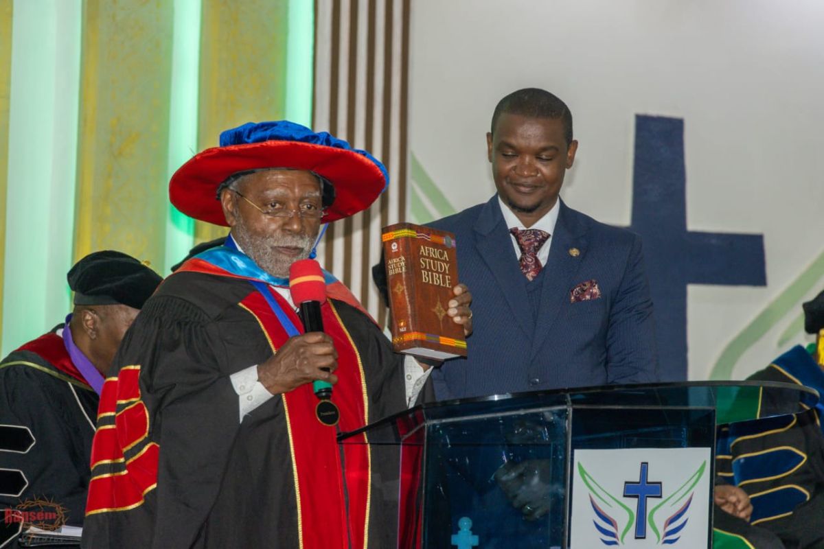 WITS ministry leaders presenting an Africa Study Bible at a seminary gathering